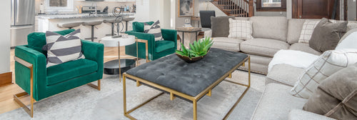 coffee table with black leather top and gold frame