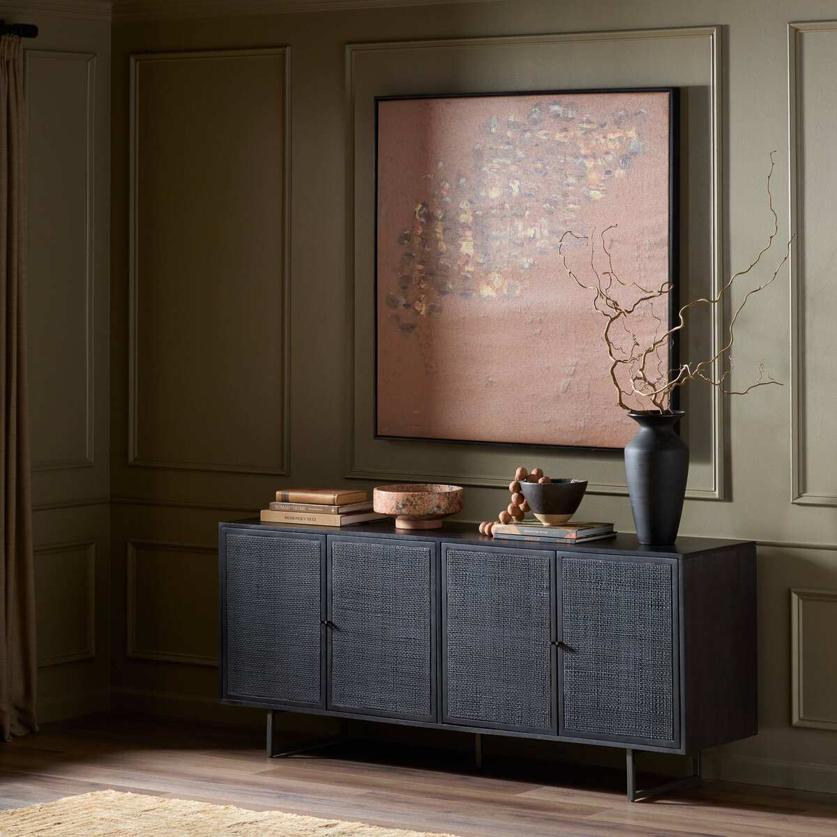 Mid-century inspired Carmel Sideboard with light cane weave and gunmetal-finished iron legs.