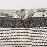 detailed view of grey and beige stripes on Nancy accent pillow