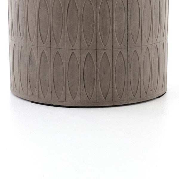 Modern Colorado End Table with intricate etching in dark grey concrete, suitable for indoor or outdoor use.